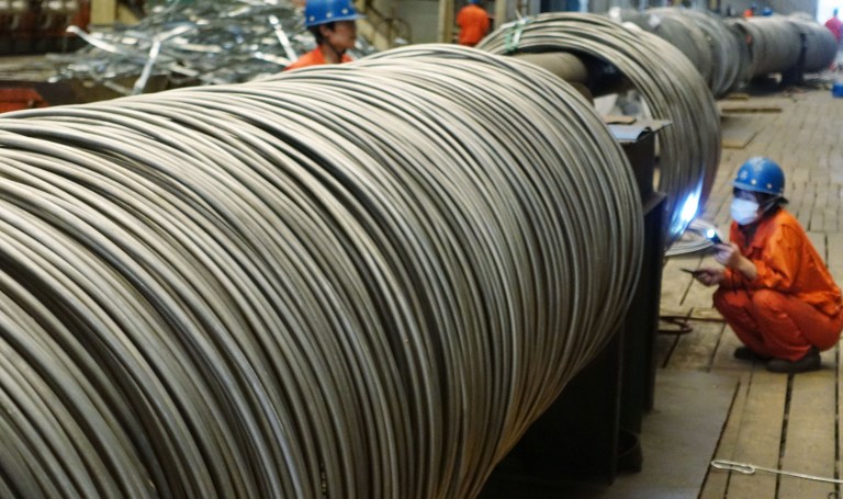 عالمية: تحسن الأرباح في الصناعات الرئيسية (معالجة البترول - الكهرباء - الفولاذ) بالصين